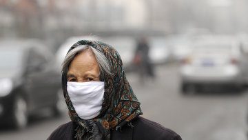 Пекинцы скупают марлевые повязки, опасаясь вредного тумана